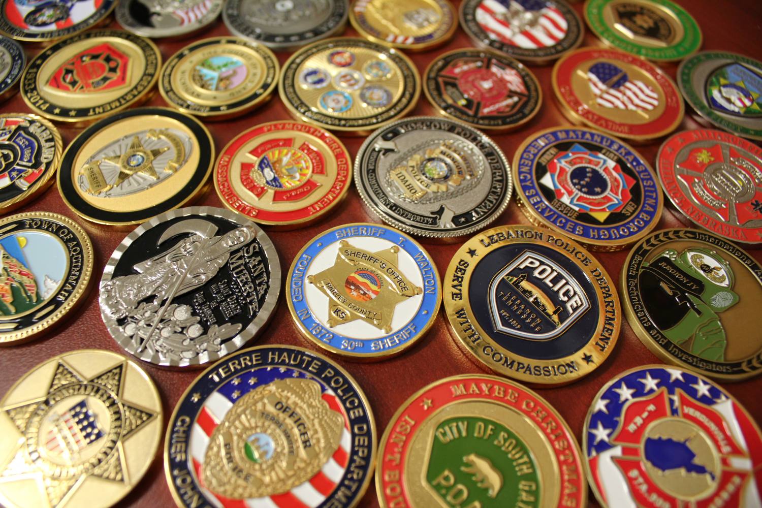 MAJOR DISPLAY: Columbus Police show off patch collections, challenge coins